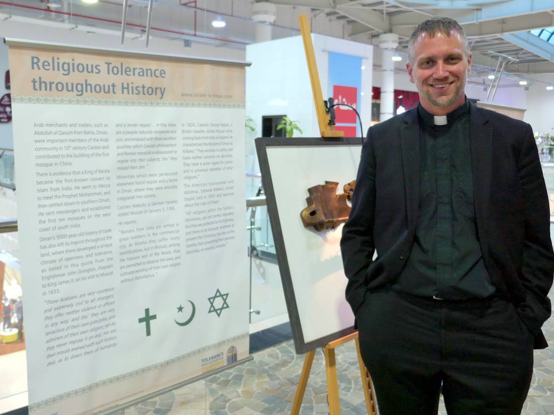 Justin Meyer at an interfaith display in the country of Oman